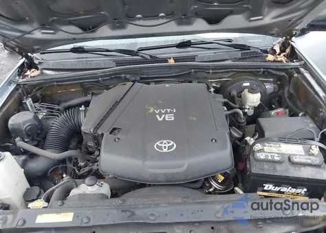 2015 Toyota Tacoma Base V6 из США, поврежденный, VIN 3TMMU4FN1FM074274